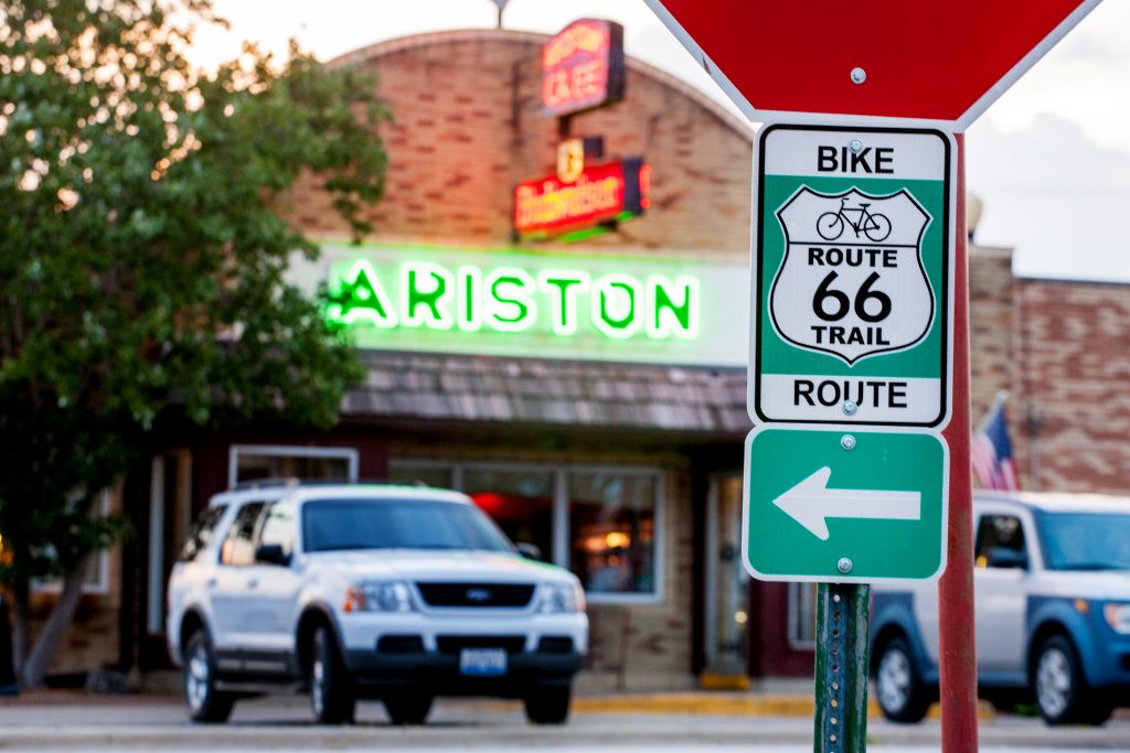 Route 66 Bicycle Trail sign in front of the Ariston Cafe